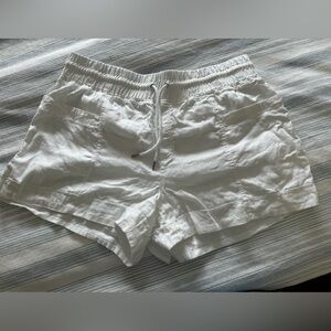 Athleta’s white linen shorts.